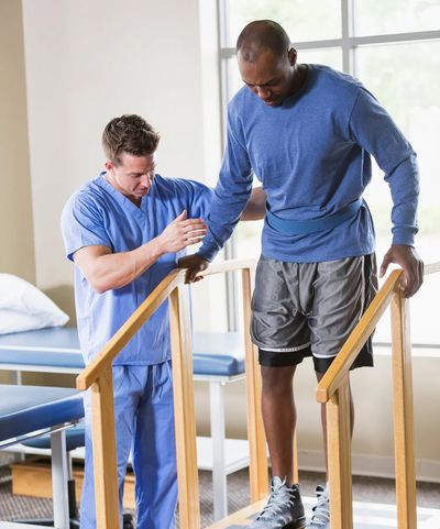 Nurse caring for and presenting care plan to elderly woman at home